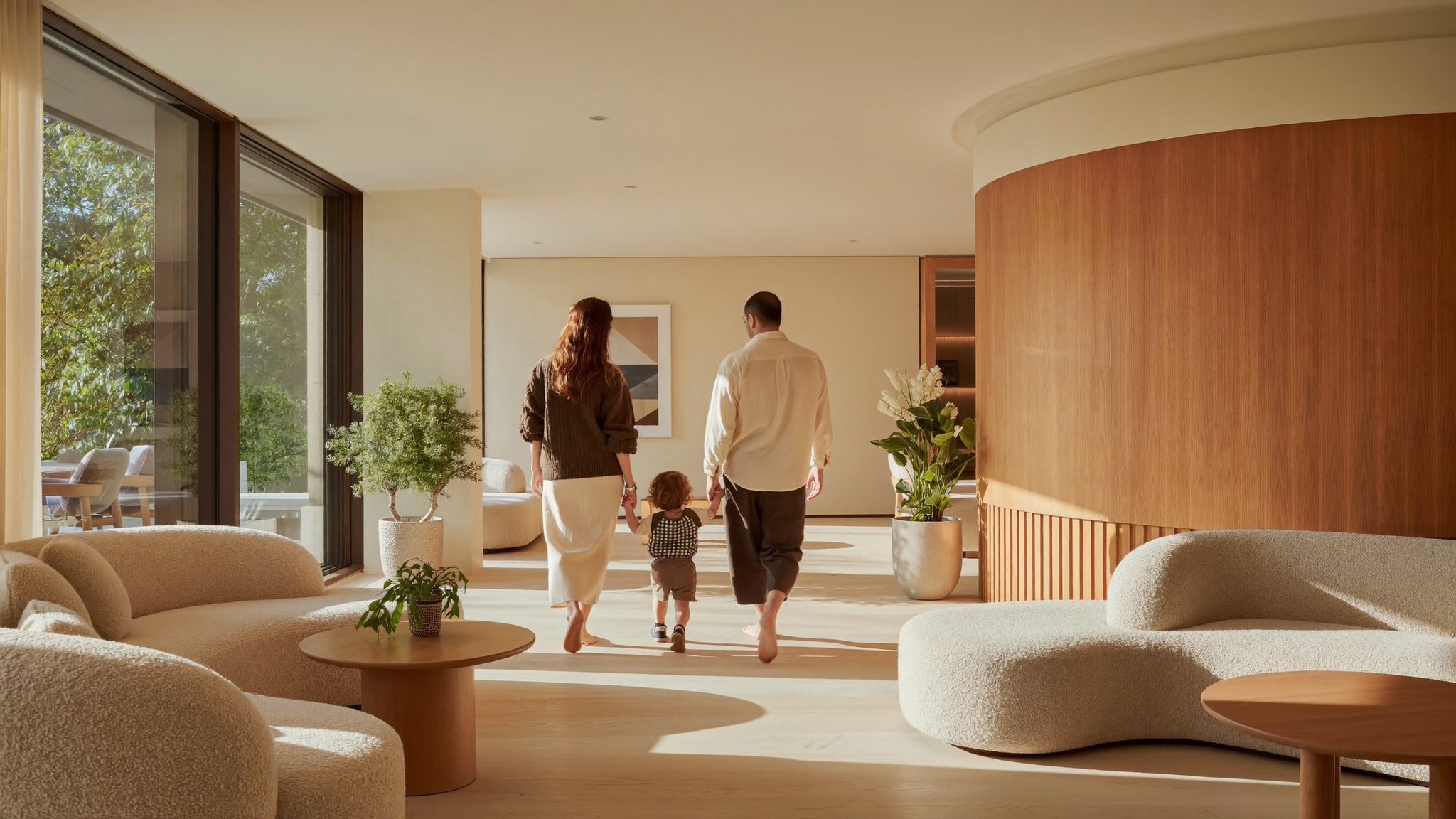 A family walking together through a sunlit wellness lounge